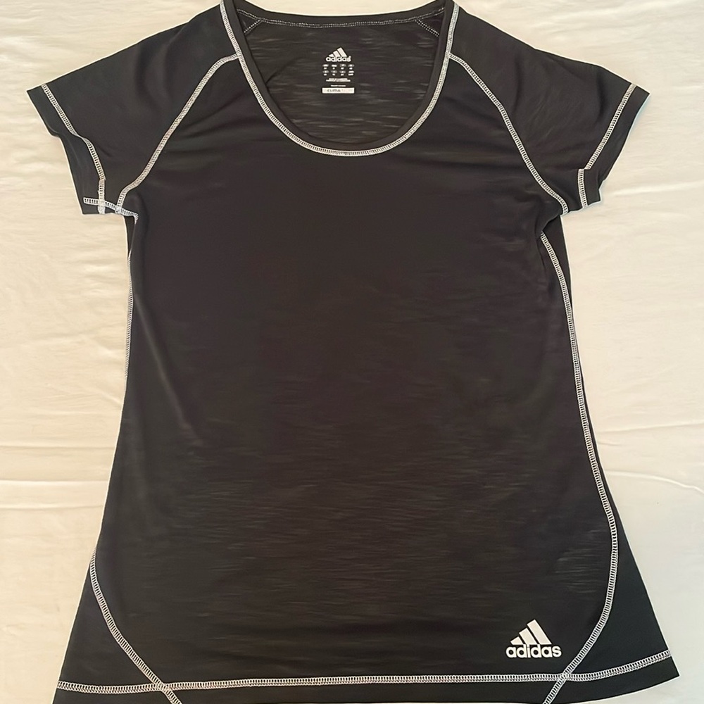 Adidas Climalite women’s tee, size M, black with white accent stitching.